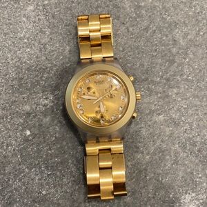 Gold swatch watch